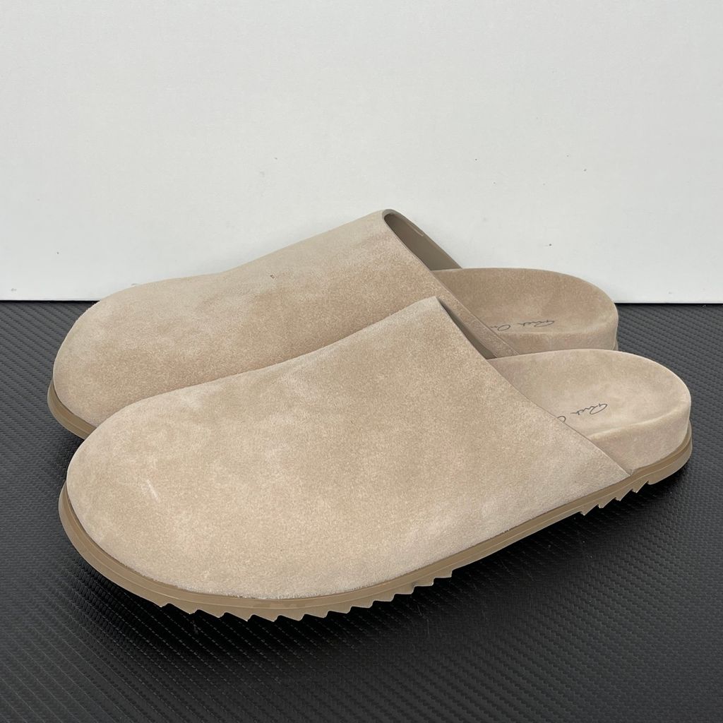 Side profile of the Rick Owens Mainline premium suede closed-toe Megalace Mule in Granola Brown, featuring a minimalist silhouette and textured finish.