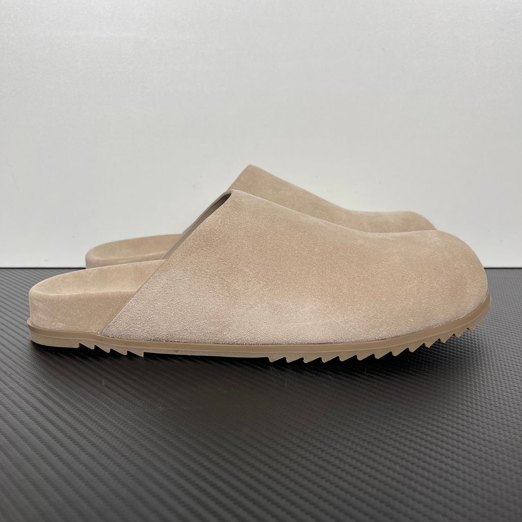 Side profile of the Rick Owens Mainline premium suede closed-toe Megalace Mule in Granola Brown, featuring a minimalist silhouette and textured finish.
