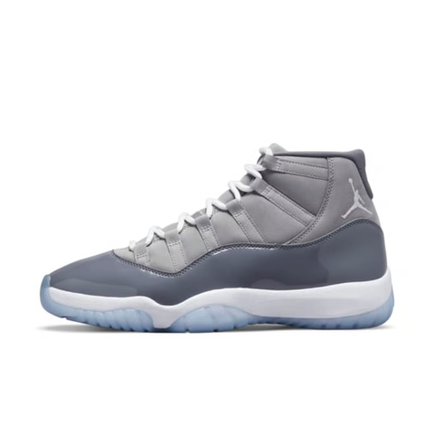 Side profile of the Air Jordan 11 Retro 'Cool Grey' (2021), showcasing the premium nubuck upper, signature high-cut grey patent leather mudguard, and white Phylon midsole.