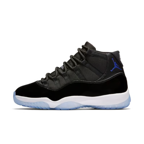 Side profile of the Air Jordan 11 Retro 'Space Jam' (2016), showcasing the black mesh upper, signature high-cut black patent leather mudguard, and crisp white Phylon midsole.