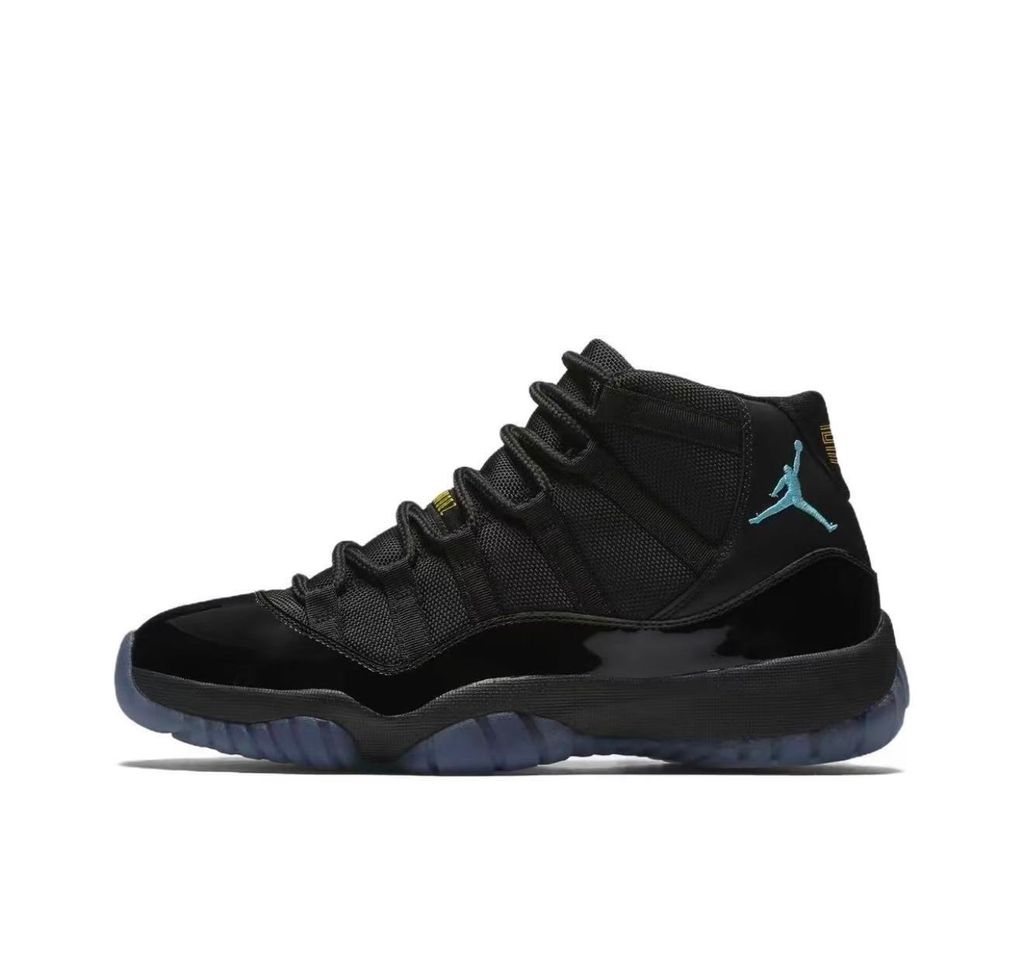Side profile of the Air Jordan 11 Retro 'Gamma Blue' (2025), showcasing the all-black ballistic mesh upper, glossy high-cut patent leather mudguard, and black Phylon midsole.