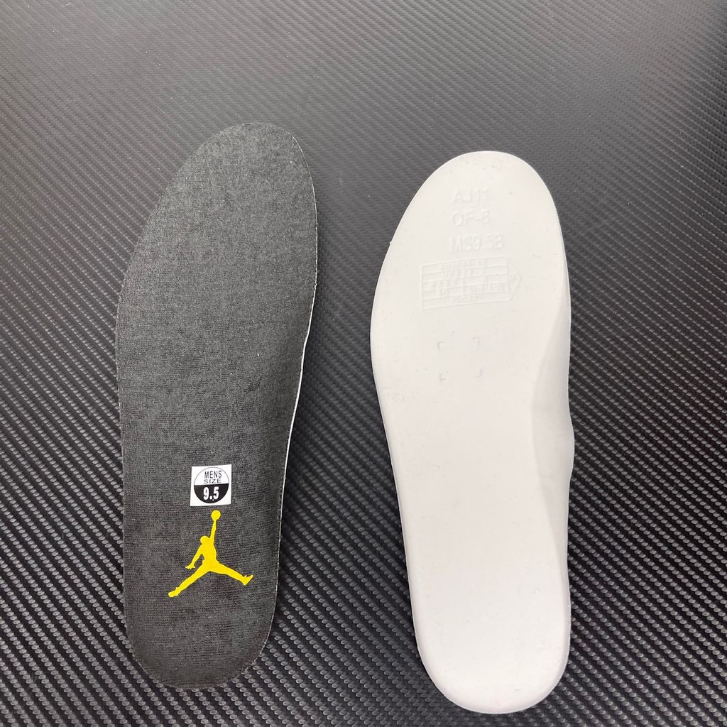 Side profile of the Air Jordan 11 Retro 'Gamma Blue' (2025), showcasing the all-black ballistic mesh upper, glossy high-cut patent leather mudguard, and black Phylon midsole.