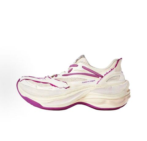 Side profile of the Balenciaga Jet low-top sneaker, showcasing the complex layered construction, white mesh and synthetic upper with vibrant purple and red accents, and the prominent 4.25cm thick platform sole.