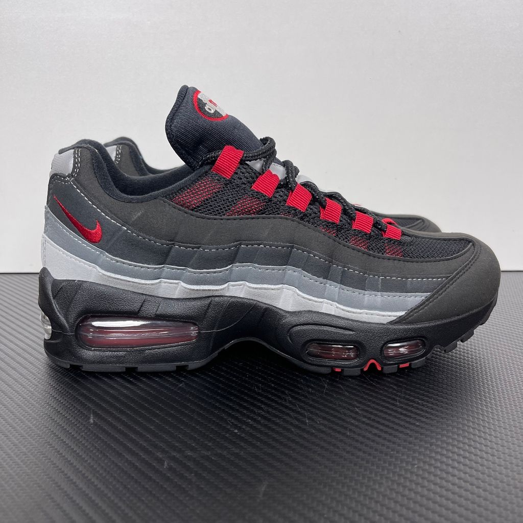 Side profile of the Nike Air Max 95 OG 'Big Bubble' x Liverpool F.C., showcasing the signature anatomy-inspired gradient upper, subtle club-inspired color accents, and the enlarged visible Air unit in the heel.