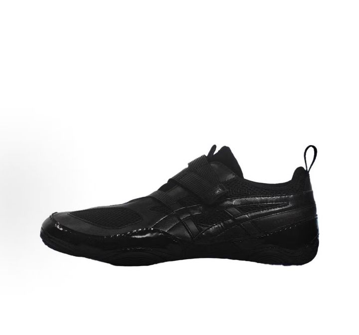 Side profile of the ASICS Hyper Taping x Issey Miyake in all-black, showcasing the sleek minimalist upper, intricate structural tape overlays, and streamlined black midsole.