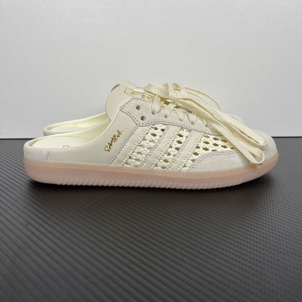 Side profile of the adidas Samba OG Mule W in Cream White, showcasing the backless slip-on silhouette, intricate woven side panels replacing the traditional 3-Stripes, premium suede T-toe, and light gum rubber outsole.