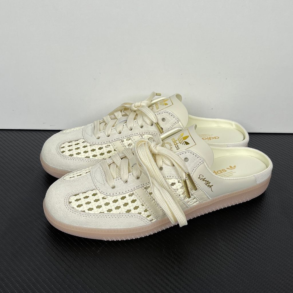 Side profile of the adidas Samba OG Mule W in Cream White, showcasing the backless slip-on silhouette, intricate woven side panels replacing the traditional 3-Stripes, premium suede T-toe, and light gum rubber outsole.