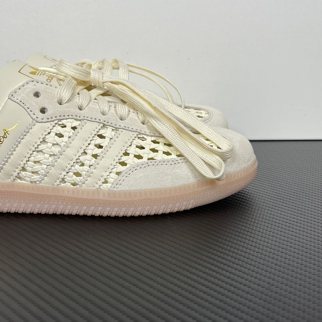 Side profile of the adidas Samba OG Mule W in Cream White, showcasing the backless slip-on silhouette, intricate woven side panels replacing the traditional 3-Stripes, premium suede T-toe, and light gum rubber outsole.
