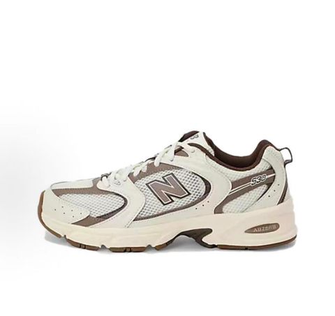 Side profile of the New Balance 530 'Turtledove Mushroom', showcasing the breathable cream mesh upper, earthy mushroom brown synthetic overlays, classic 'N' logo, and the chunky ABZORB cushioned midsole.