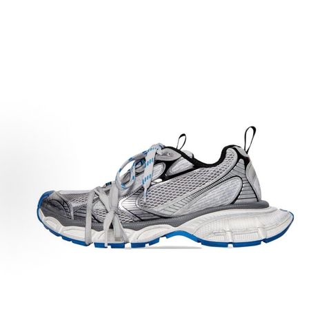 Side profile of the Balenciaga 3XL "Worn-Out Grey Blue" sneaker, highlighting the signature distressed finish, intricate layered mesh and synthetic overlays, and the exaggerated, sculpted chunky midsole.