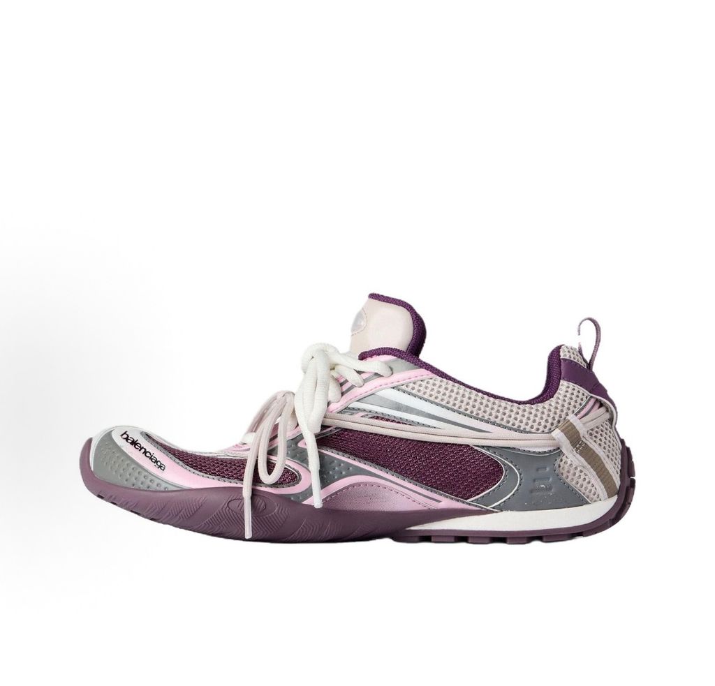 Side profile of the Balenciaga Radar Sneaker, showcasing the breathable purple mesh upper, grey and pink gradient line overlays, signature white wraparound laces, and classic Balenciaga branding on the toe.
