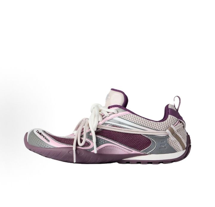 Side profile of the Balenciaga Radar Sneaker, showcasing the breathable purple mesh upper, grey and pink gradient line overlays, signature white wraparound laces, and classic Balenciaga branding on the toe.