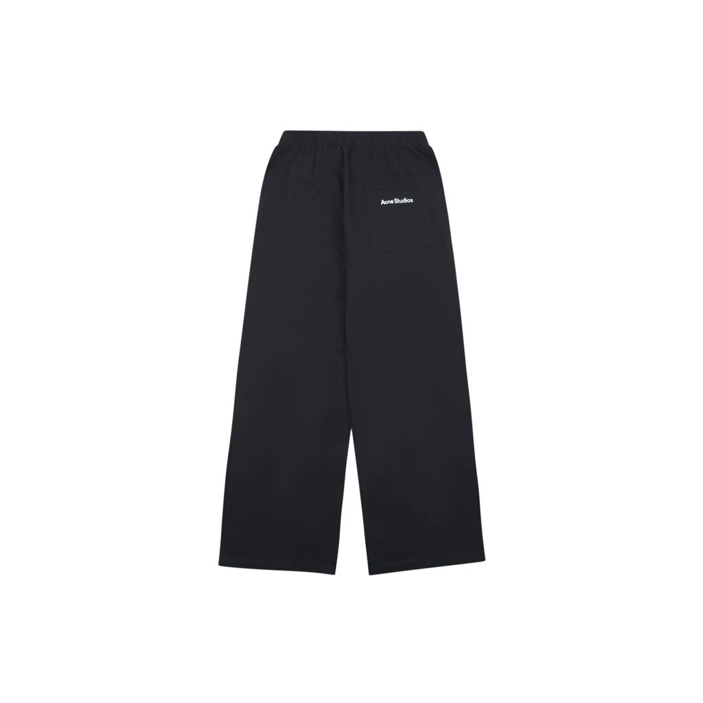 acne-studios-rear-pocket-small-label-print-pants