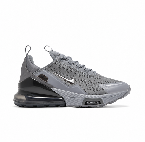 Side profile of the Nike Air Max 270 Premium sneaker in a sleek 'Smoke Grey' colorway, showcasing the upgraded breathable upper, tonal synthetic overlays, and the massive, signature translucent 270-degree Max Air heel unit.