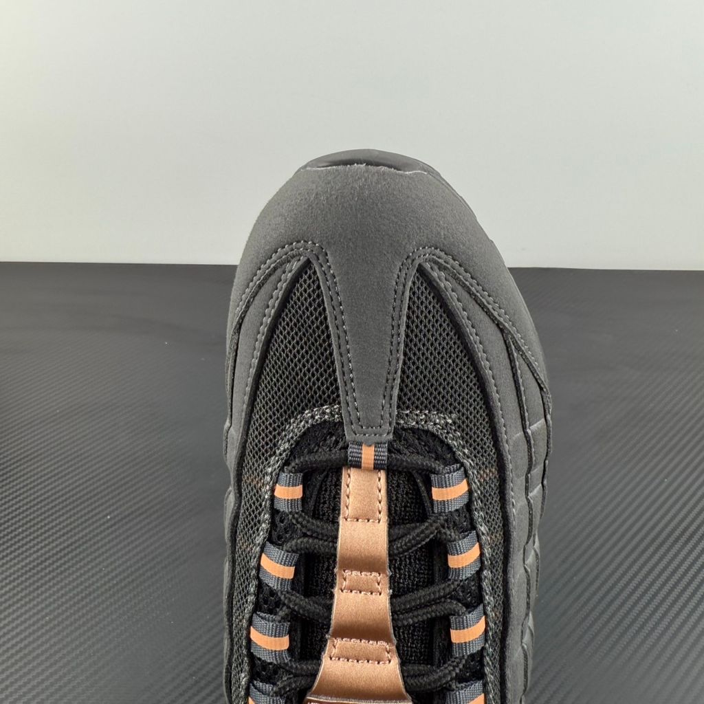 Side profile of the Nike Air Max 95 Central Cee 'Live Yours' sneaker, showcasing the UK drill-inspired dark and metallic layered upper, reflective 3M detailing, exclusive branding, and the signature visible Max Air cushioning units in the black midsole.