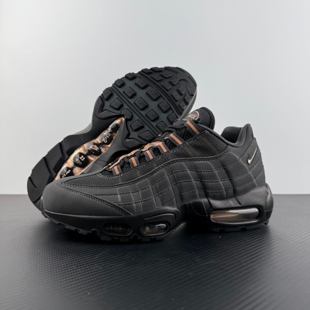Side profile of the Nike Air Max 95 Central Cee 'Live Yours' sneaker, showcasing the UK drill-inspired dark and metallic layered upper, reflective 3M detailing, exclusive branding, and the signature visible Max Air cushioning units in the black midsole.
