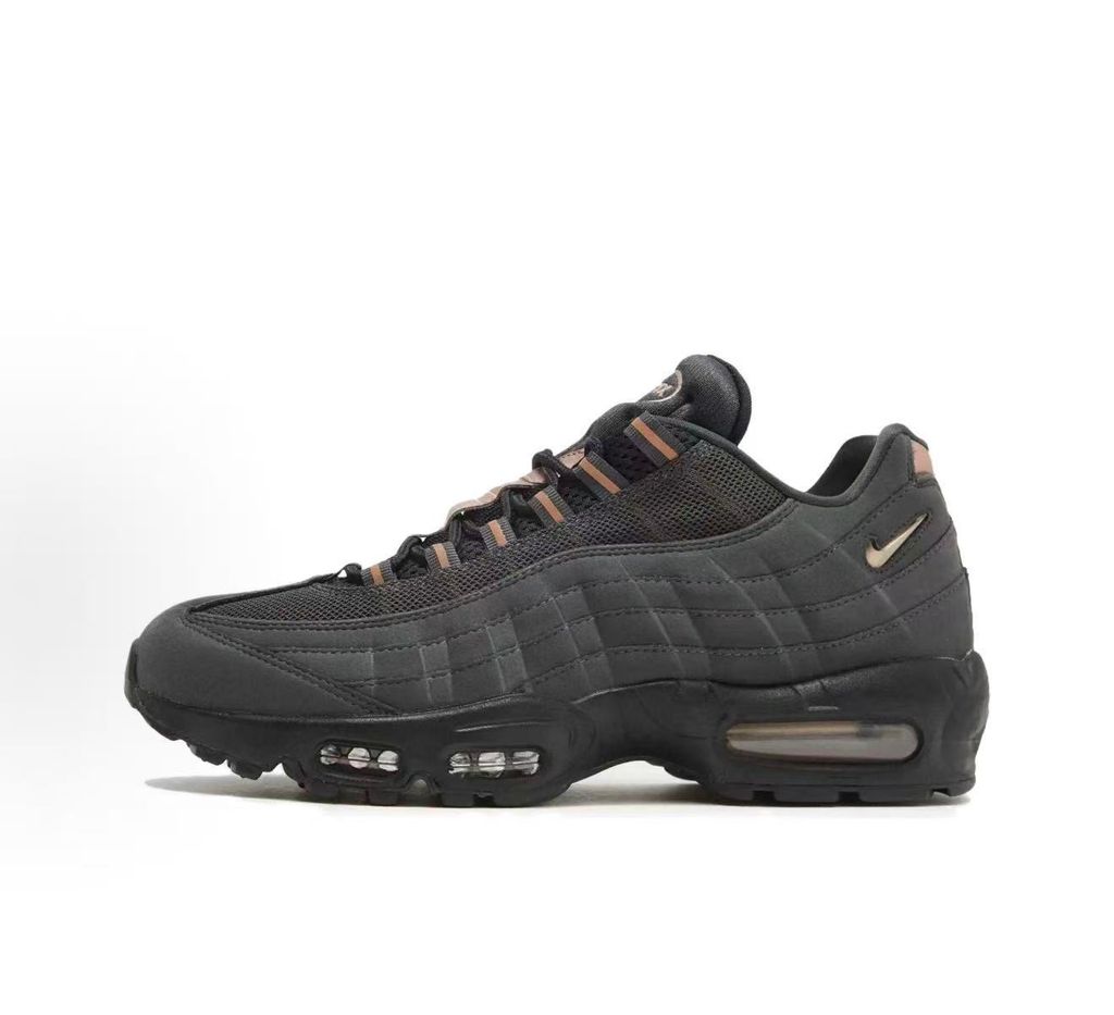 Side profile of the Nike Air Max 95 Central Cee 'Live Yours' sneaker, showcasing the UK drill-inspired dark and metallic layered upper, reflective 3M detailing, exclusive branding, and the signature visible Max Air cushioning units in the black midsole.