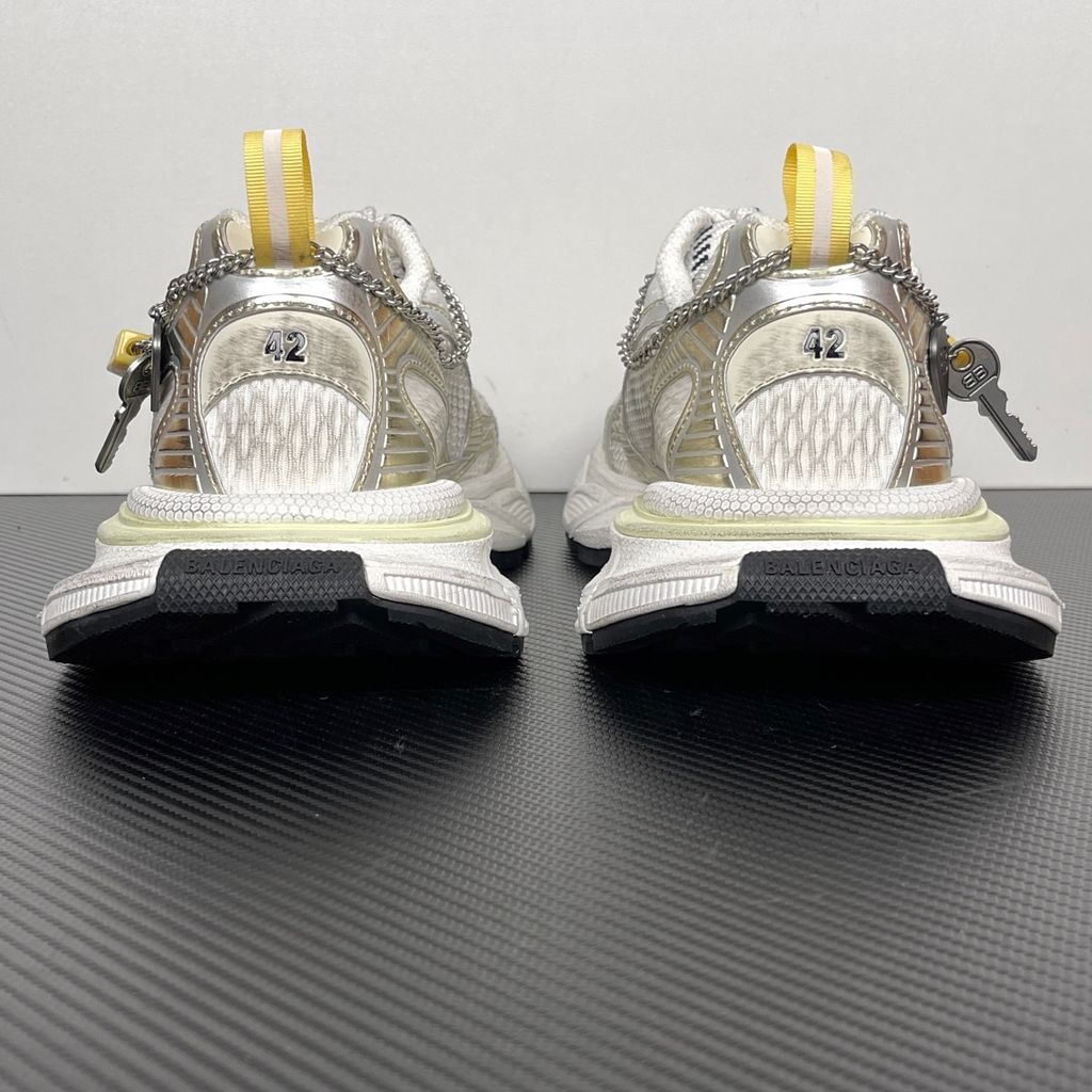 Side profile of the Nike Air Max 270 Premium sneaker in a subtle 'Football Grey' and 'Work Blue' colorway, highlighting the updated breathable premium upper, tonal overlays, and the massive, signature translucent 270-degree Max Air heel unit.