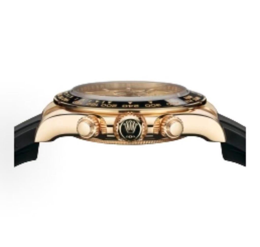 Front-facing view of the Rolex Cosmograph Daytona 126518LN, highlighting the polished 18ct yellow gold case, contrasting black Cerachrom tachymetric bezel, and the sophisticated golden and black dial with snailed counters.
