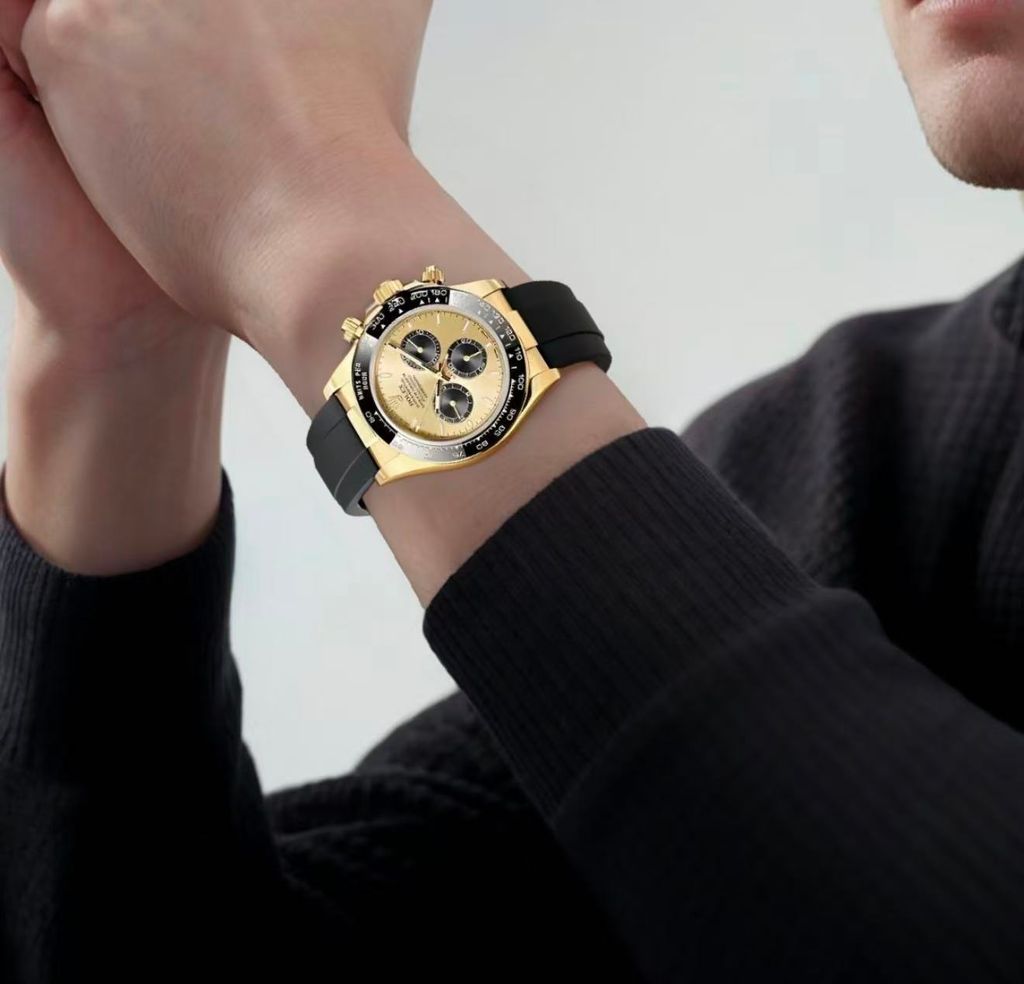 Front-facing view of the Rolex Cosmograph Daytona 126518LN, highlighting the polished 18ct yellow gold case, contrasting black Cerachrom tachymetric bezel, and the sophisticated golden and black dial with snailed counters.
