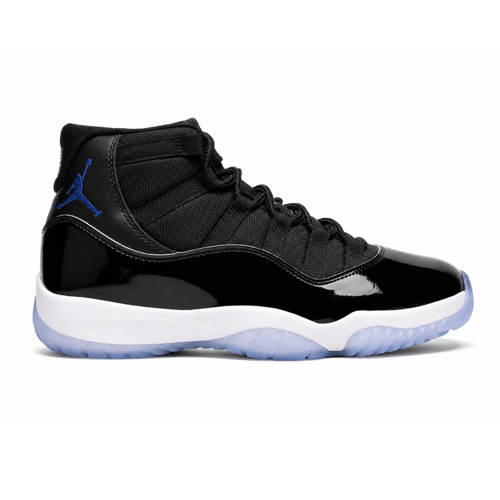 Side profile of the Air Jordan 11 Retro 'Space Jam' (2026), showcasing the high-gloss black patent leather mudguard, premium black mesh upper, white midsole, and the signature icy blue translucent outsole.
