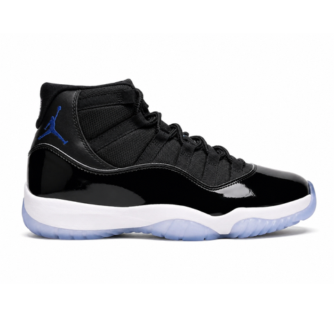 Side profile of the Air Jordan 11 Retro 'Space Jam' (2026), showcasing the high-gloss black patent leather mudguard, premium black mesh upper, white midsole, and the signature icy blue translucent outsole.