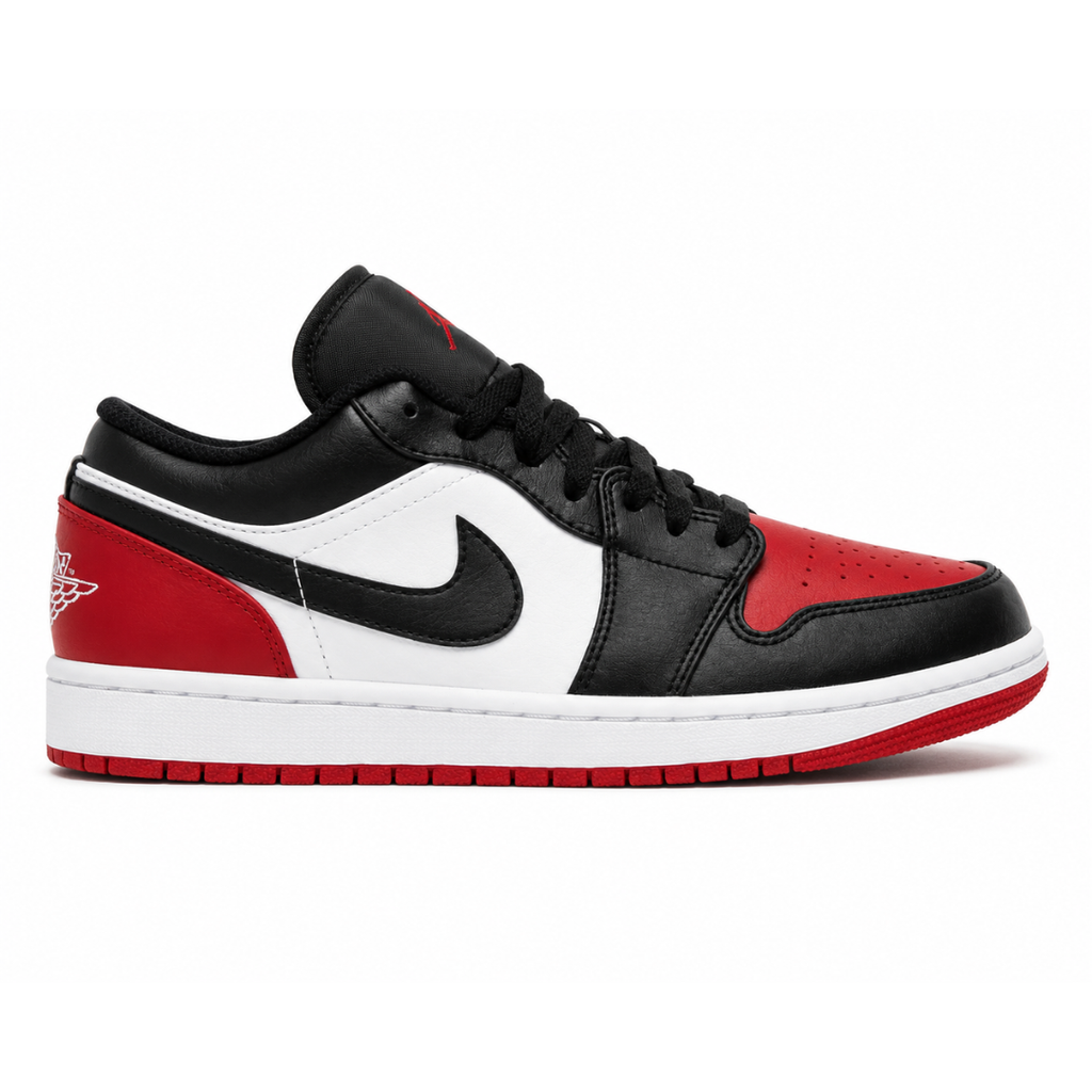 Side profile of the Air Jordan 1 Low 'Bred Toe 2.0' sneaker, showcasing the sharp white, black, and red color blocking, signature Swoosh branding, and the classic low-top profile.