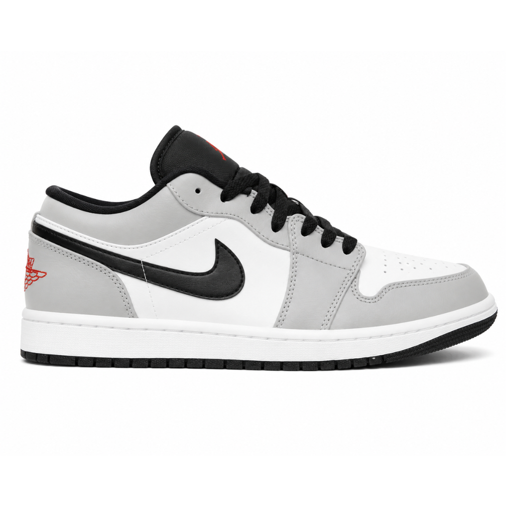Side profile of the Air Jordan 1 Low 'Light Smoke Grey' sneaker, highlighting the smooth white base, contrasting Light Smoke Grey overlays, black Swoosh branding, and the classic low-top profile.