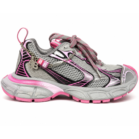Side profile of the Balenciaga 3XL Gradient sneaker in 'Grey Pink', showcasing the exaggerated chunky midsole, intricate layered mesh and metallic upper, and the signature hanging chain charm hardware.