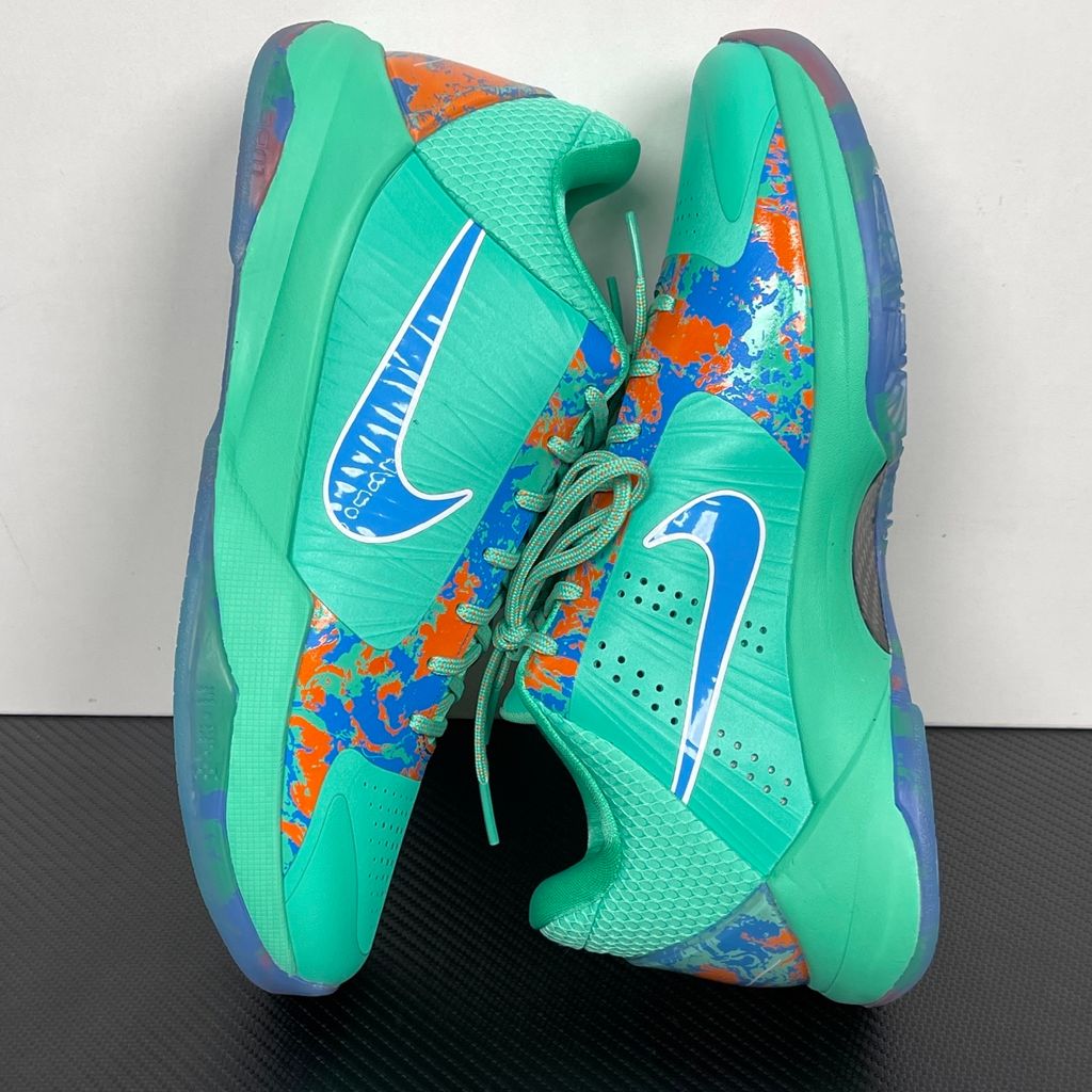 Side profile of the Nike Kobe 5 Protro 'Jalen Brunson NY vs. NY' PE sneaker, highlighting the sharp, low-top performance silhouette, signature Kobe detailing, and the unique color blocking inspired by NYC basketball.
