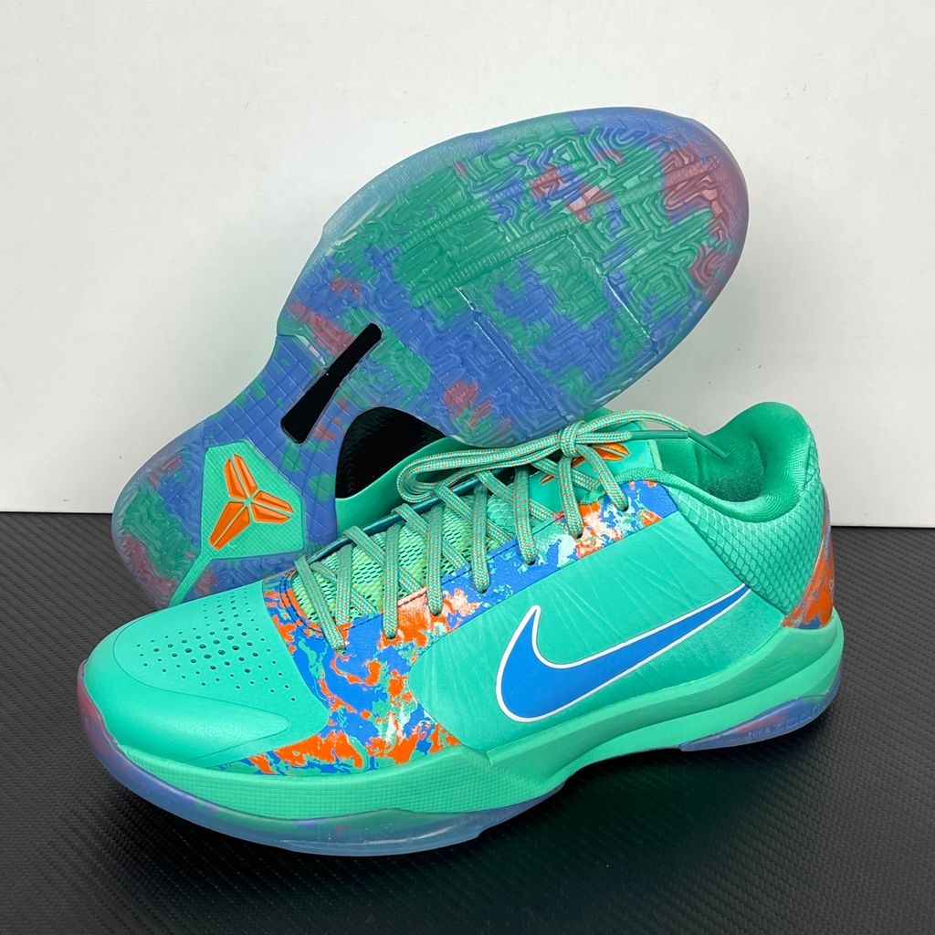 Side profile of the Nike Kobe 5 Protro 'Jalen Brunson NY vs. NY' PE sneaker, highlighting the sharp, low-top performance silhouette, signature Kobe detailing, and the unique color blocking inspired by NYC basketball.