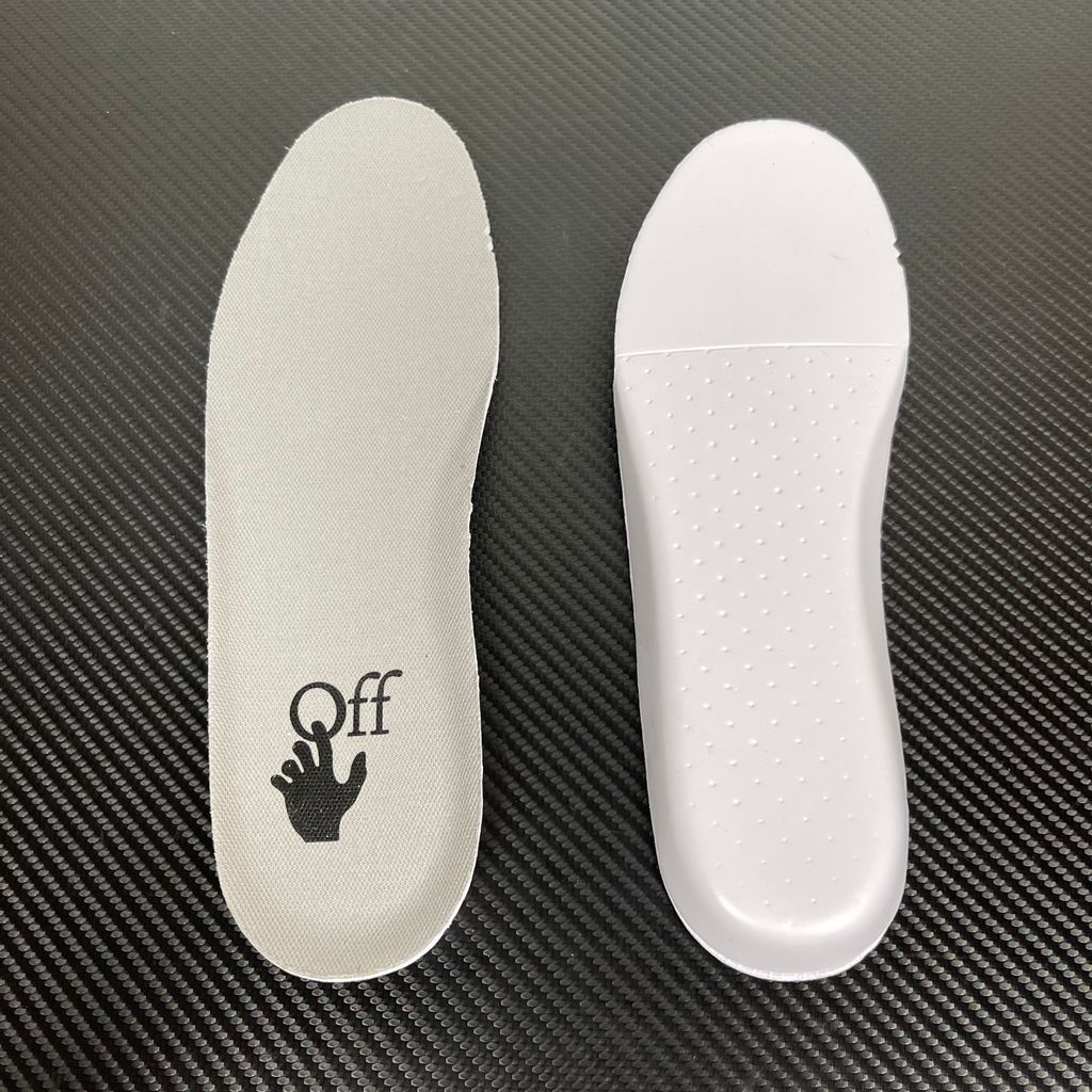 Side profile of the Off-White Out of Office sneaker in a Distressed Dark Grey colorway, highlighting the iconic "FOR WALKING" text printed on the midsole, signature arrow motif, and premium weathered suede construction.