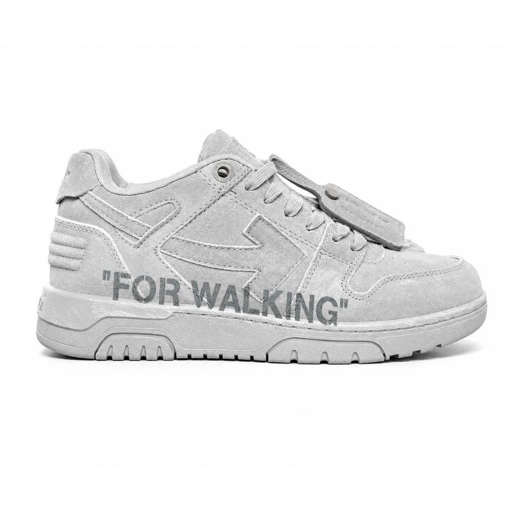 Side profile of the Off-White Out of Office sneaker in a Distressed Dark Grey colorway, highlighting the iconic "FOR WALKING" text printed on the midsole, signature arrow motif, and premium weathered suede construction.