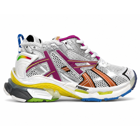 Side profile of the Balenciaga Runner sneaker in the 'Multicolor' colorway, highlighting the intricate multi-layered construction, distressed technical mesh and synthetic overlays, and the iconic dynamic sole unit.