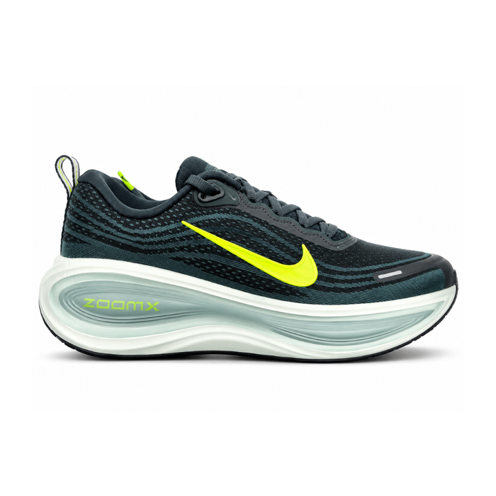 Side profile of the Nike Vomero Plus running shoe, featuring an earthy green engineered mesh upper with Seaweed and Cannon overlays, striking neon Volt accents, and a heavily cushioned, sculpted ZoomX foam midsole.
