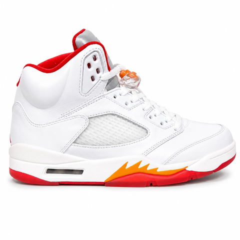 Side profile of the Air Jordan 5 Retro sneaker in the 'Sunset' colorway, featuring a crisp leather upper, vibrant orange and red sunset gradient accents, signature translucent netting, and the iconic shark tooth midsole detailing.