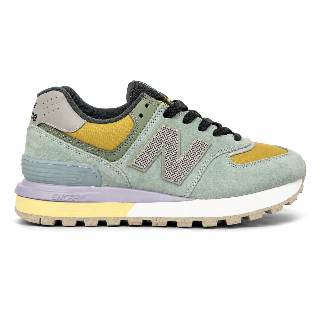 Side profile of the New Balance 574 Legacy Stone Island sneaker featuring a tactical light green ripstop and suede upper, the iconic Stone Island compass logo on the tongue, and a rugged grey ENCAP midsole.