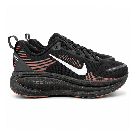 Side profile of the Nike Vomero 18 running shoe featuring a rich, tonal 'Coffee Bean' brown engineered mesh upper, subtle tonal Nike Swoosh branding, and a heavily cushioned, sculpted foam midsole.