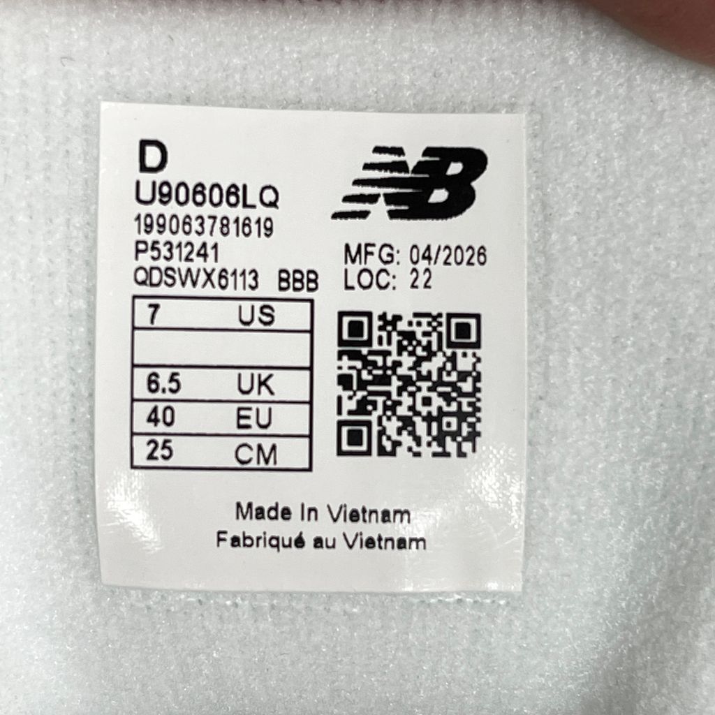 Side profile of the New Balance 9060 sneaker in a creamy Angora and Sea Salt colorway, featuring a chunky sculpted ABZORB midsole, premium suede overlays, a breathable mesh base, and the signature 'N' logo.