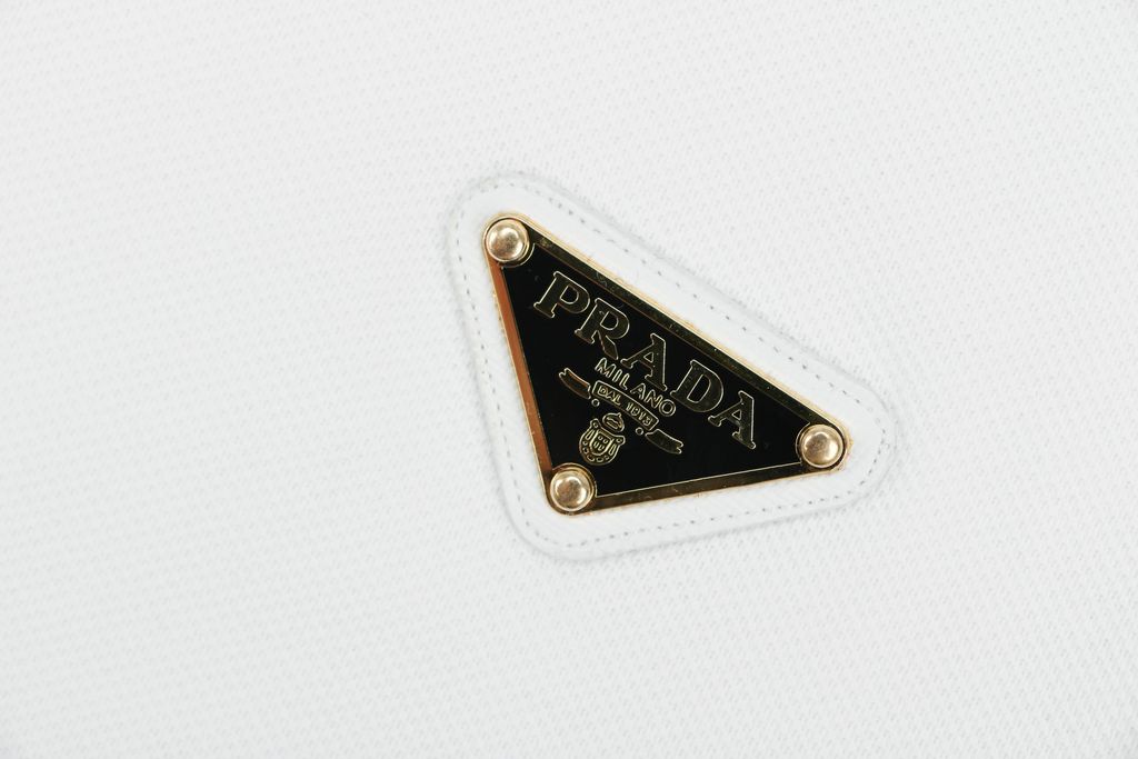 Prada-inspired gold triangle logo short-sleeve polo shirt