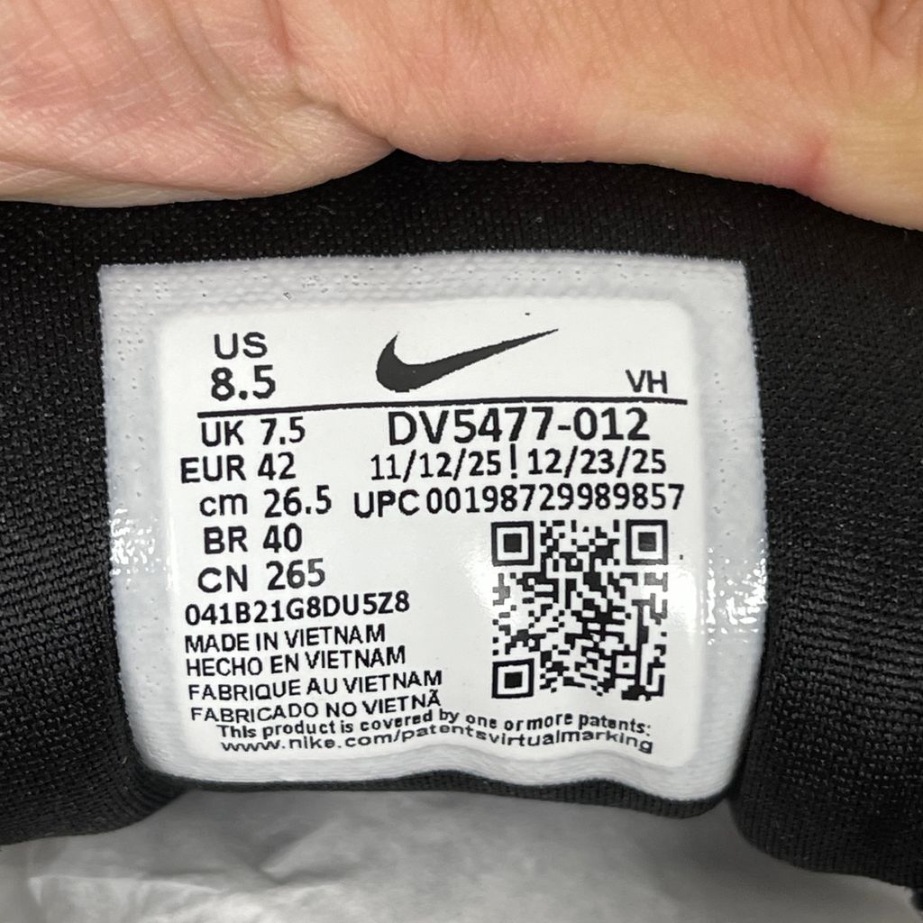 Side profile of the Nike SB Force 58 skate shoe featuring a sleek Black suede and Cool Gray canvas upper, accented by a crisp Mountain Peak White Swoosh and detailing, resting on a white sole with a flexible tri-star tread.