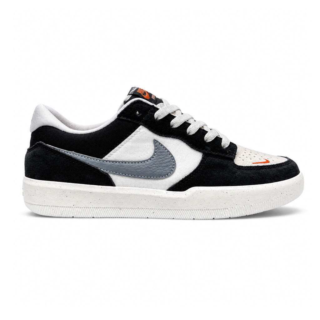 Side profile of the Nike SB Force 58 skate shoe featuring a sleek Black suede and Cool Gray canvas upper, accented by a crisp Mountain Peak White Swoosh and detailing, resting on a white sole with a flexible tri-star tread.