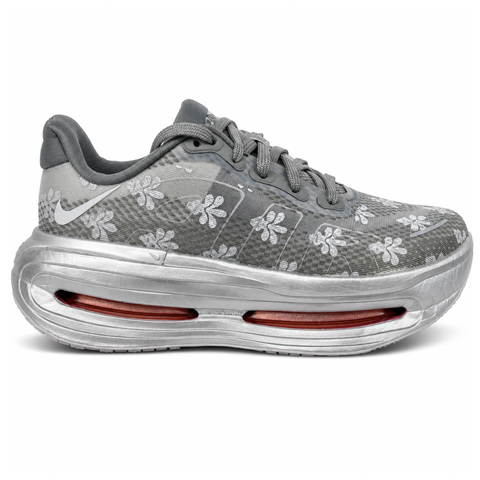 Side profile of the Nike Vomero Premium QS sneaker in a refined Fleur De-Lis and Geyser Grey colorway, featuring a layered mesh and premium synthetic upper, signature plastic side cage, and a responsive Zoom Air midsole.