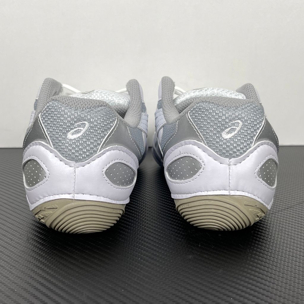 Side profile of the ASICS Hypersync running shoe featuring a breathable white mesh upper, sharp Piedmont Grey synthetic leather overlays, signature ASICS Tiger Stripes, and a sculpted performance midsole.