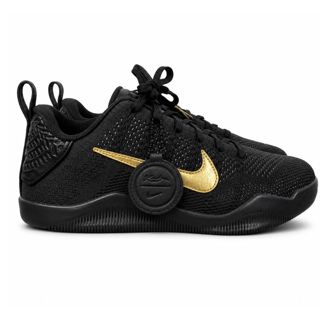 Side profile of the Nike Kobe 11 Elite Low Protro basketball shoe in the Fade to Black colorway, featuring a sleek dark grey-to-black gradient Flyknit upper, a tonal metallic Swoosh, and a solid black rubber outsole.