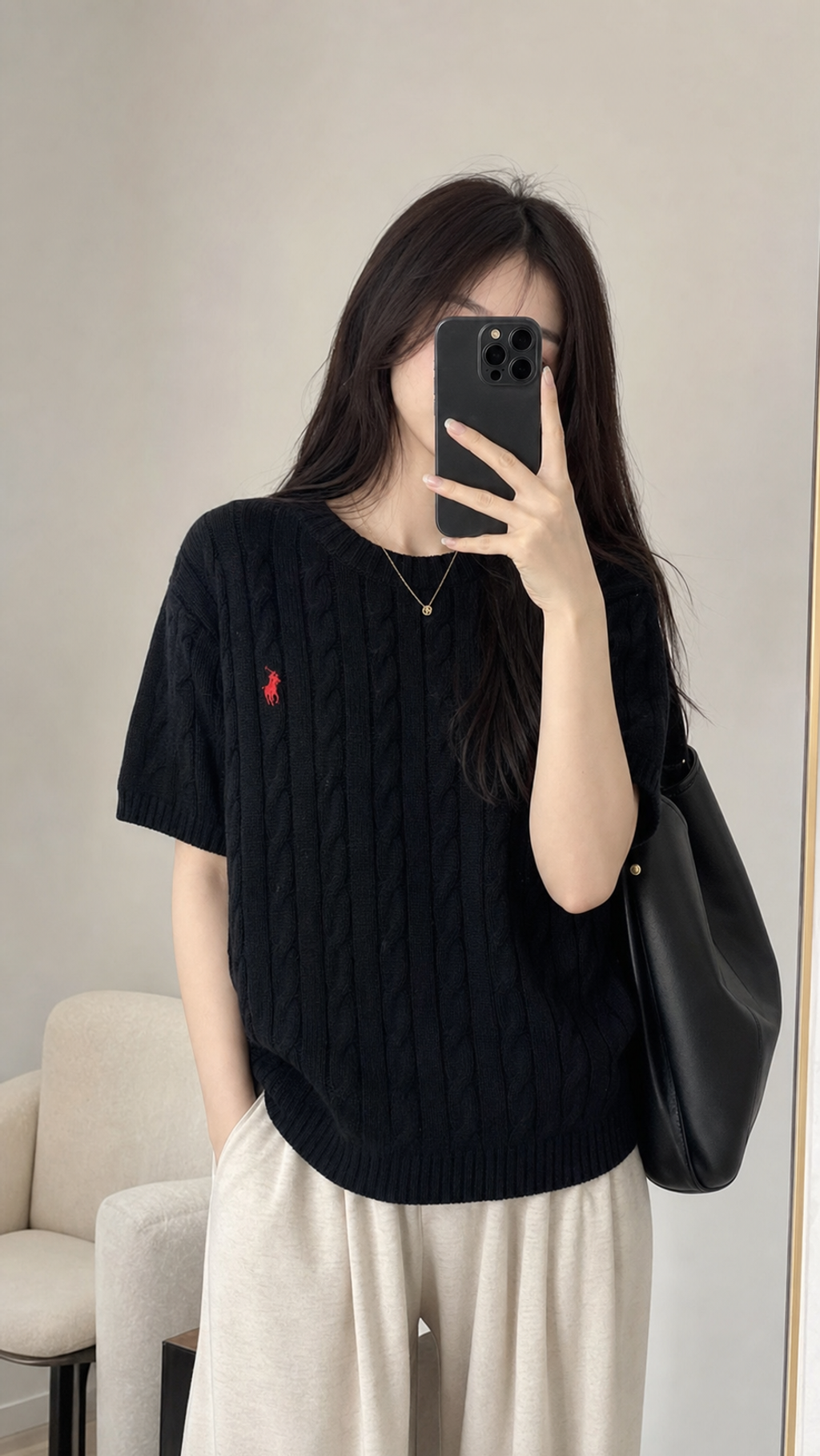 Unisex black cable-knit sweater with red detail