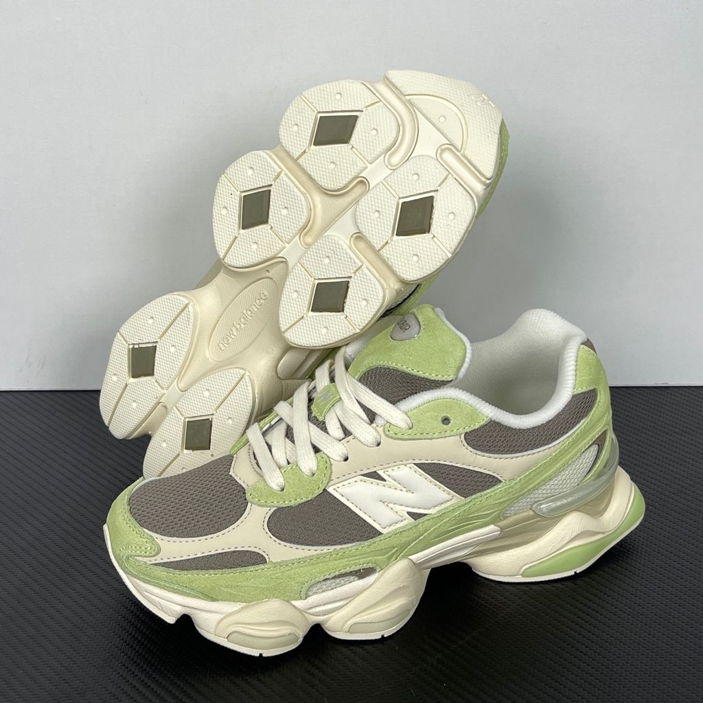 Side profile of the Women's New Balance 9060 sneaker featuring a breathable Dry Lime mesh upper, premium Thunder Brown suede overlays, a classic 'N' logo, and a dramatic, chunky wavy midsole with ABZORB cushioning.