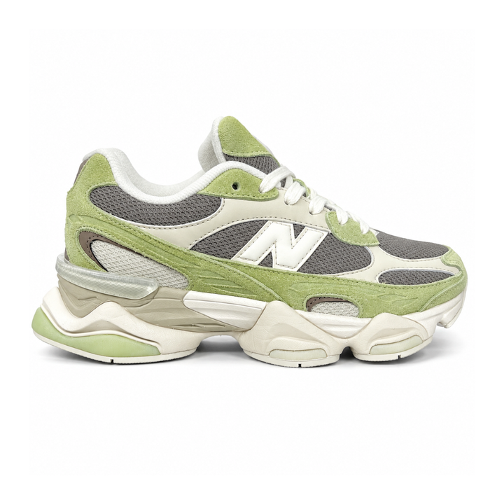 Side profile of the Women's New Balance 9060 sneaker featuring a breathable Dry Lime mesh upper, premium Thunder Brown suede overlays, a classic 'N' logo, and a dramatic, chunky wavy midsole with ABZORB cushioning.