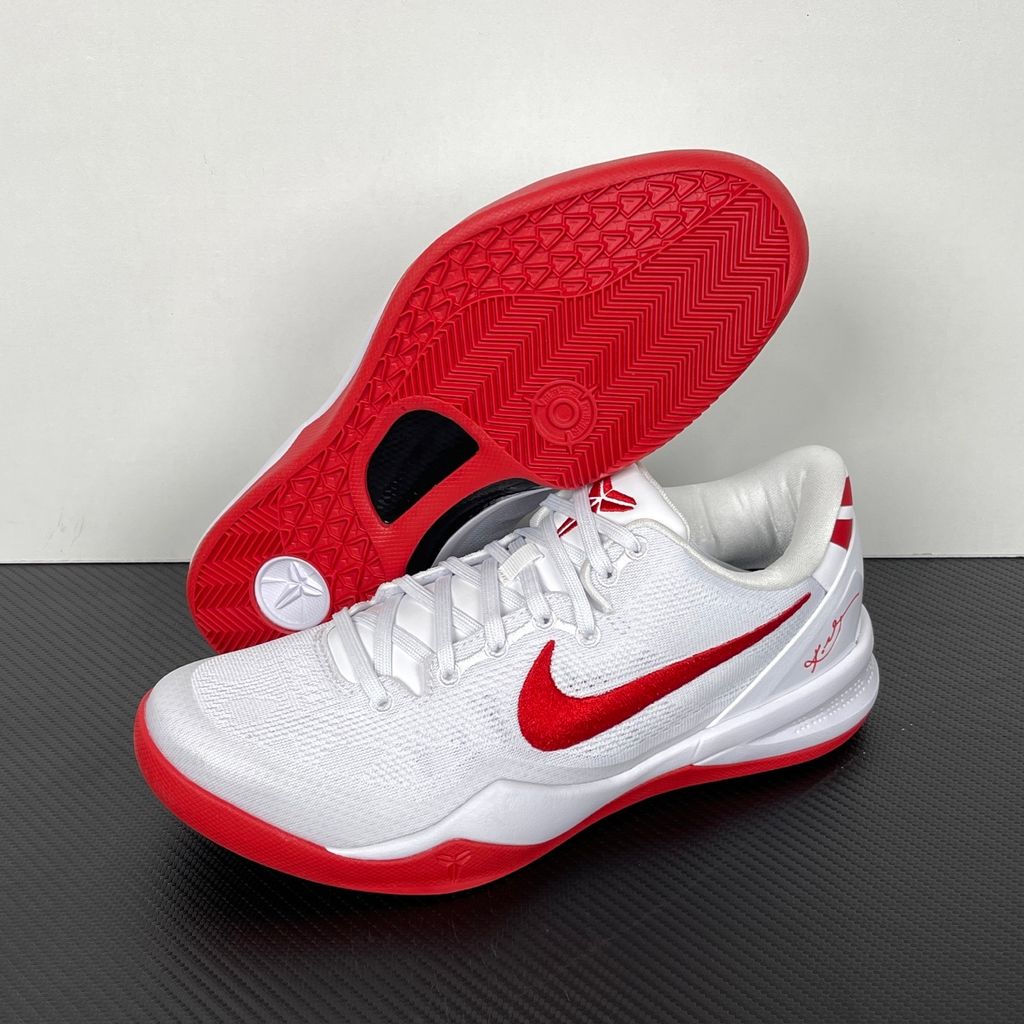 Side profile of the Nike Kobe 8 Protro TB Promo basketball shoe featuring a clean white Engineered Mesh upper, vibrant University Red accents on the embroidered Swoosh and laces, and a white rubber outsole with a carbon fiber shank plate.