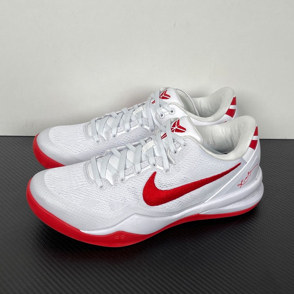 Side profile of the Nike Kobe 8 Protro TB Promo basketball shoe featuring a clean white Engineered Mesh upper, vibrant University Red accents on the embroidered Swoosh and laces, and a white rubber outsole with a carbon fiber shank plate.